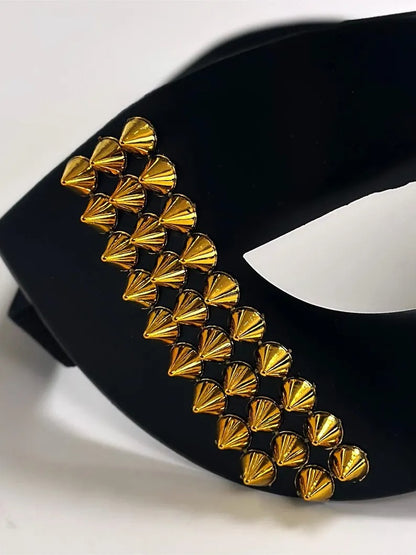 Black Venetian masquerade mask with bold gold stud accents, men’s edgy half-face party mask.