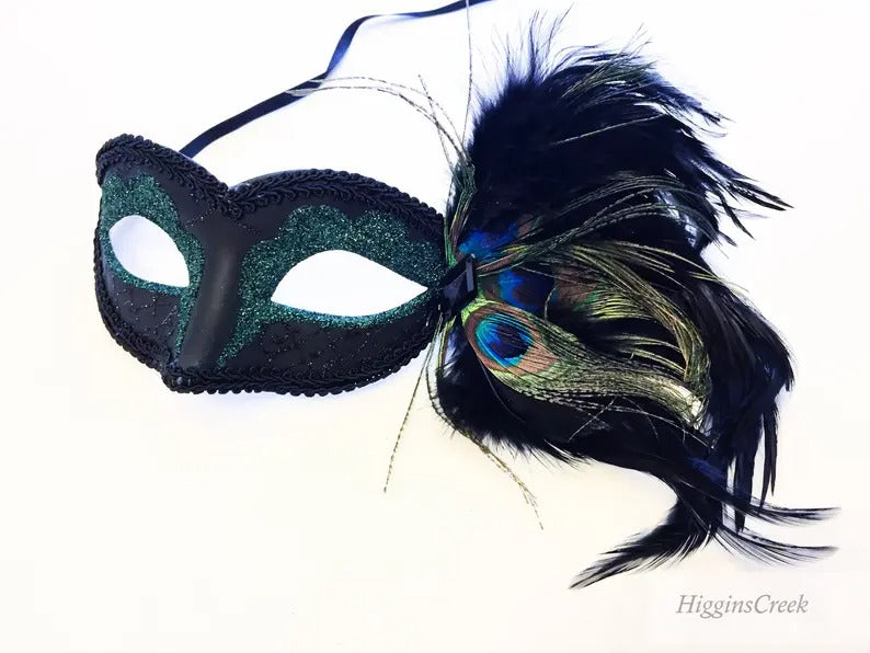 Black and green masquerade mask with glitter accents and peacock feathers, perfect for prom, weddings, and masquerade balls.