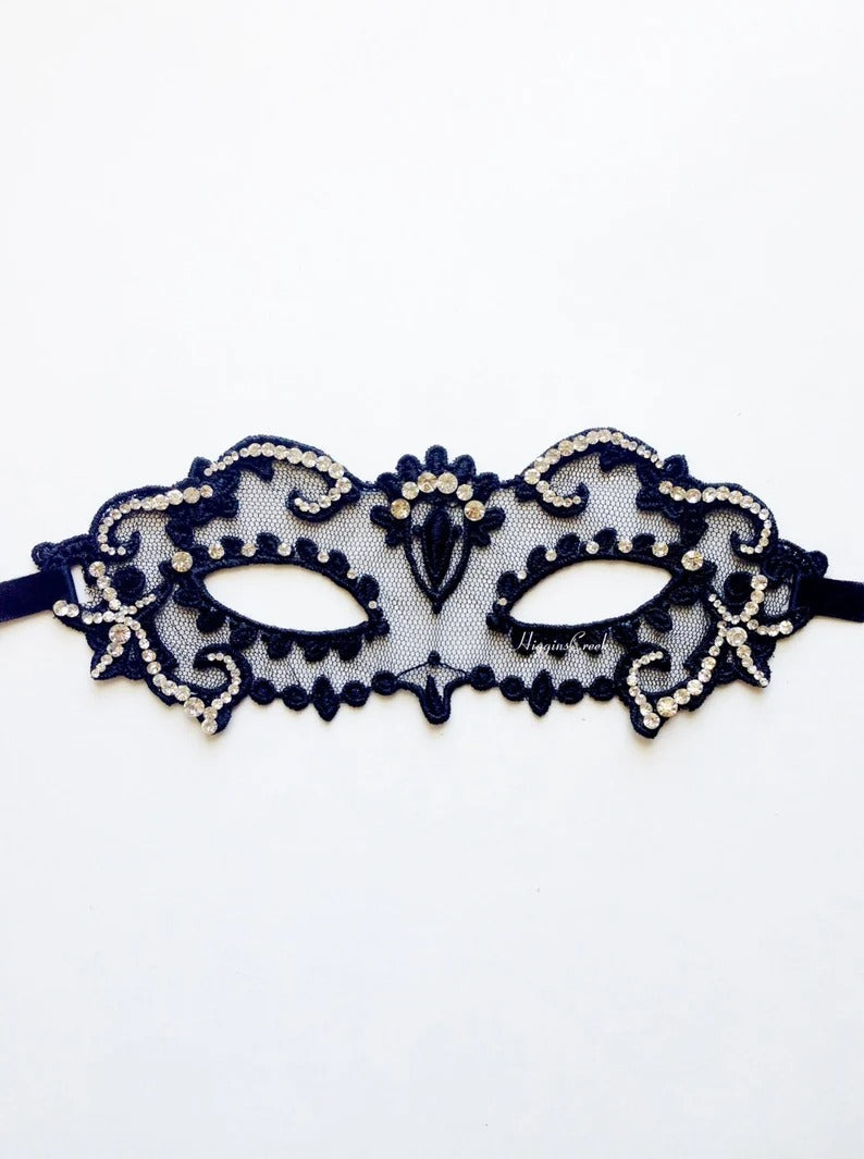 Elegant black lace masquerade mask with rhinestone details for women’s prom, ball, or party.