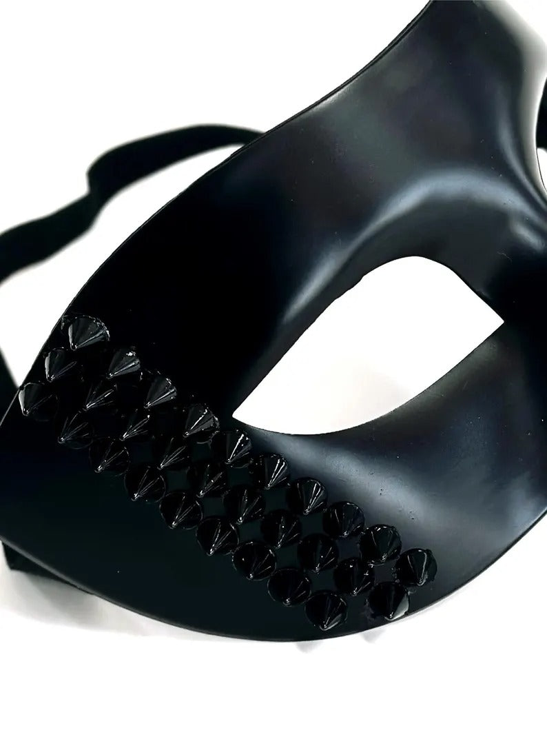 Black Venetian masquerade mask with bold black stud accents, men’s edgy half-face party mask.