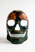 Black sugar skull mask with flames and colorful swirls.