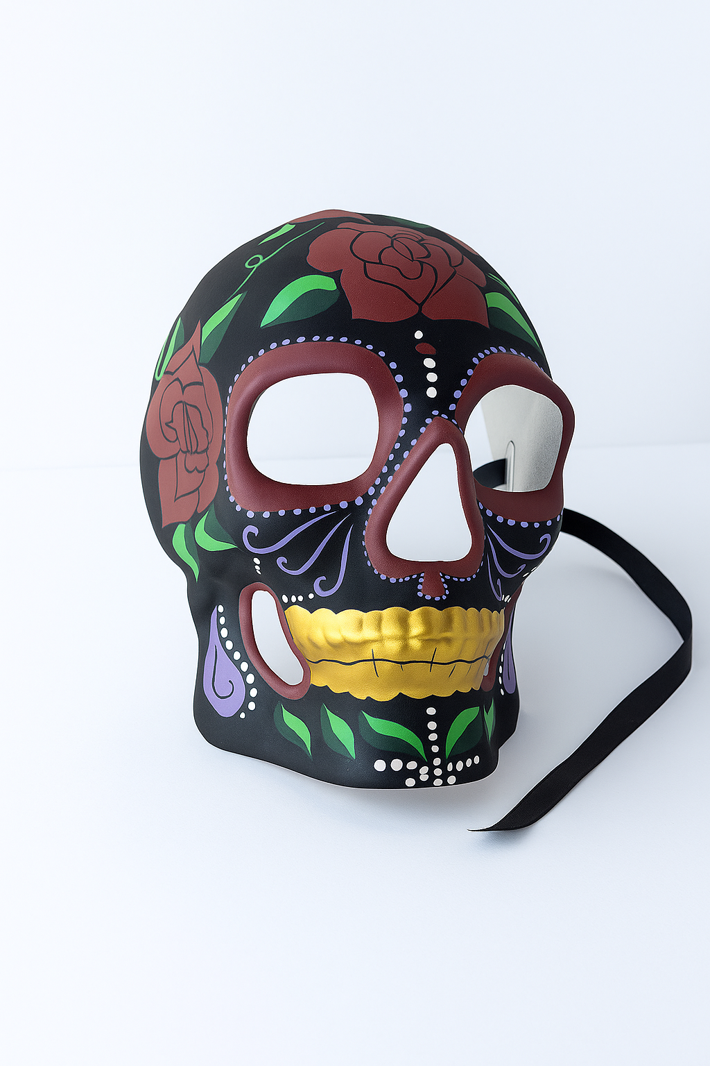 Black sugar skull mask with red roses and gold teeth.