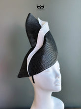 Black and white sculpted fascinator hat for weddings, derby races, and formal events.