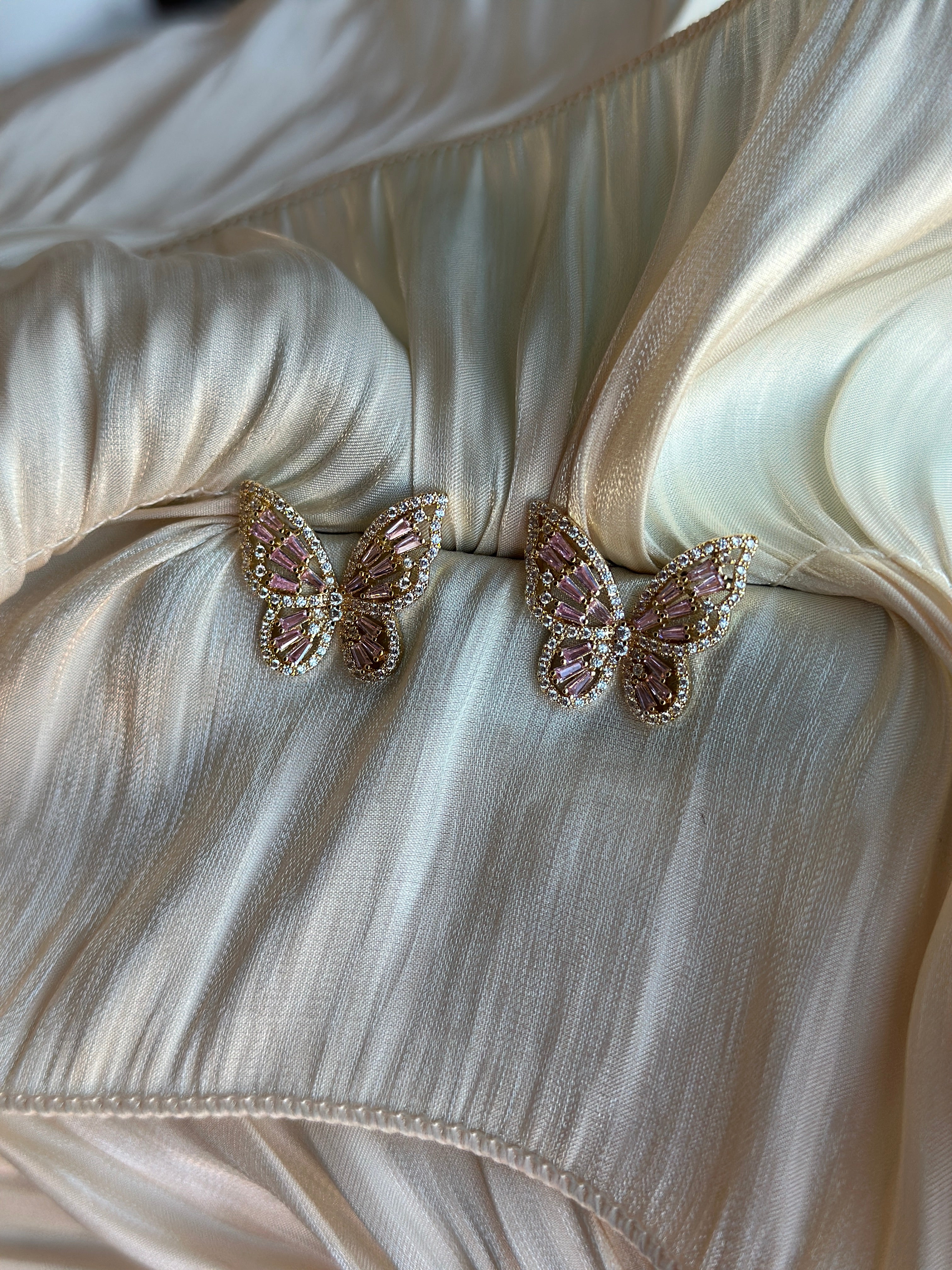 Gold butterfly earrings with pink crystal wings 