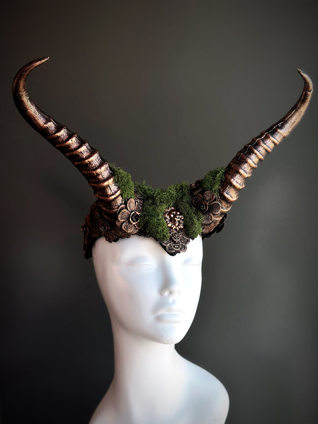 Copper horned headpiece with green moss, perfect for gothic, fantasy, and festival styling.