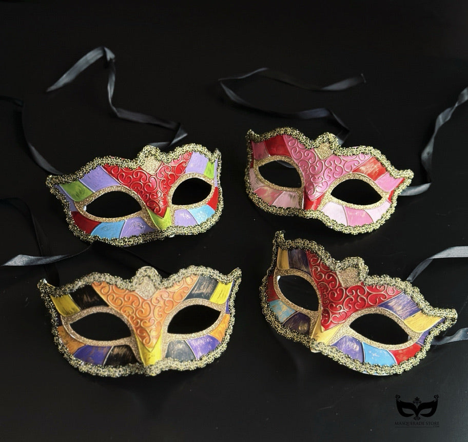 Bulk Venetian masquerade masks with colorful mosaic-style panels, embossed scrollwork, metallic gold detailing, and braided trim.