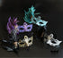 Bulk feathered Venetian masquerade masks with ornate filigree design in assorted colors for Mardi Gras parties and masquerade events.