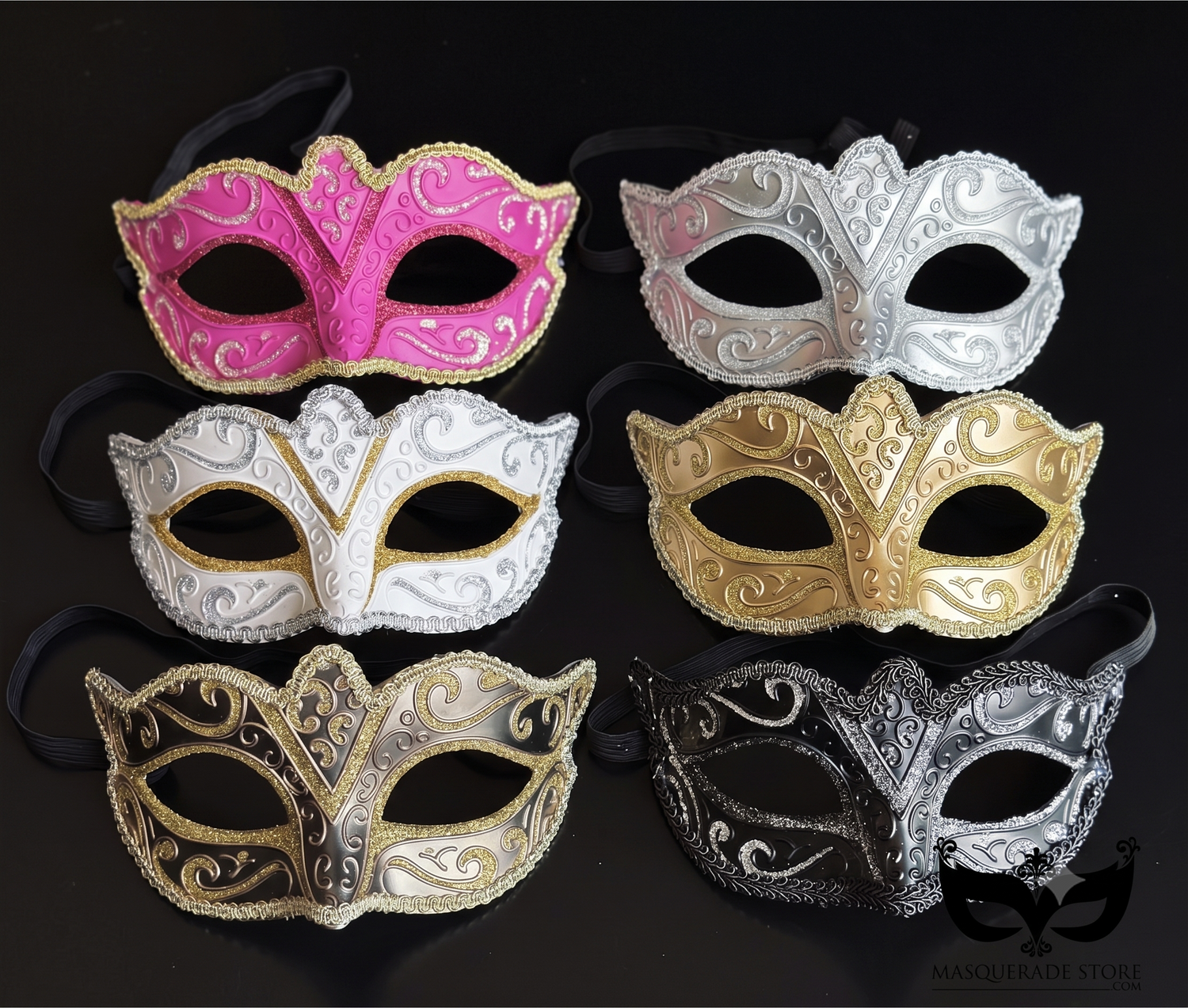 Bulk Venetian masquerade masks featuring embossed scrollwork, glitter trim, metallic finishes, and assorted elegant colors.