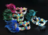 Bulk Harlequin masquerade masks featuring glitter diamond patterns, colorful feather plumes, and Venetian Carnival styling.