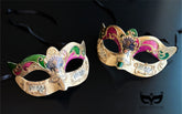 Bulk Venetian Mardi Gras masquerade masks with purple, green, and gold accents, Carnival artwork, musical notes, and ornate gold detailing.