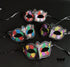 Bulk black Harlequin masquerade masks featuring colorful glitter diamond patterns, crystal accents, and Venetian Carnival styling.