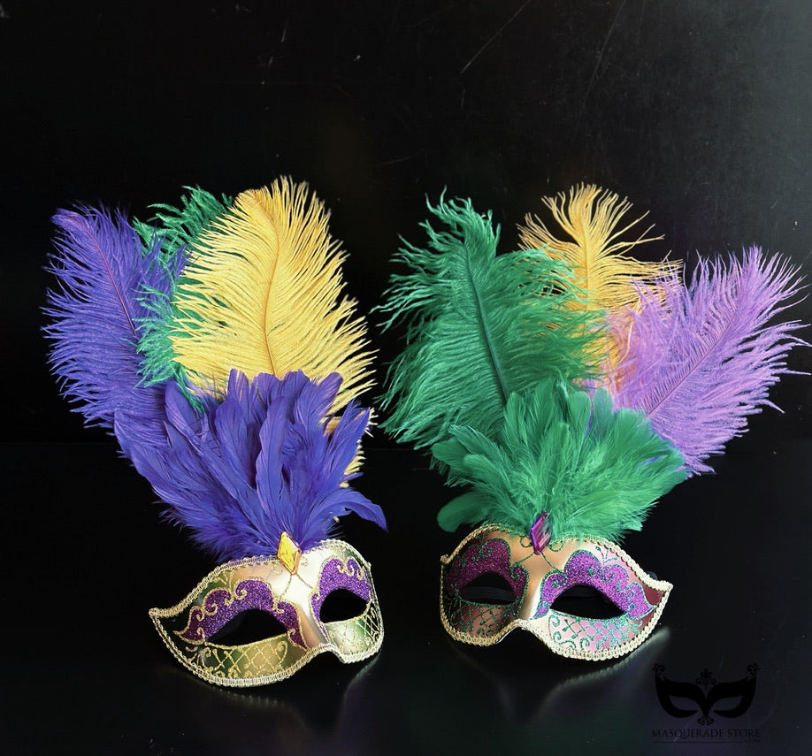 Bulk Venetian masquerade masks with genuine ostrich feather plumes, glitter filigree, jeweled accents, and purple, green, and gold Mardi Gras colors.