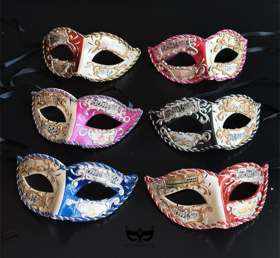 Bulk Venetian masquerade masks featuring musical note motifs, Venetian cityscape artwork, antique gold scrollwork, and colorful braided trim for masquerade balls, Mardi Gras, weddings, and themed events.