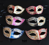 Bulk Venetian masquerade masks featuring musical note motifs, Venetian cityscape artwork, antique gold scrollwork, and colorful braided trim for masquerade balls, Mardi Gras, weddings, and themed events.