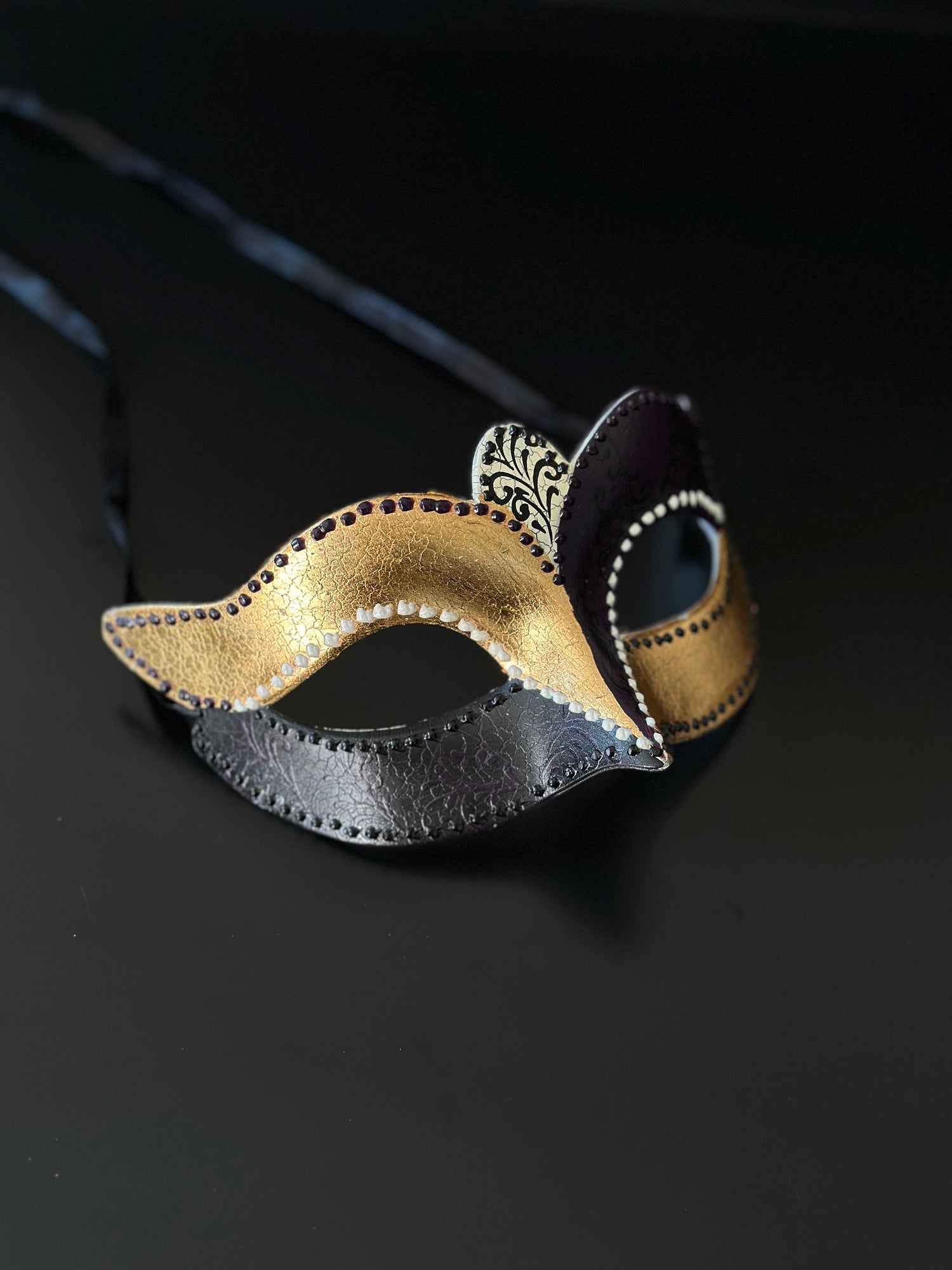 Assorted bulk masquerade mask set in gold and black with ornate design for group events