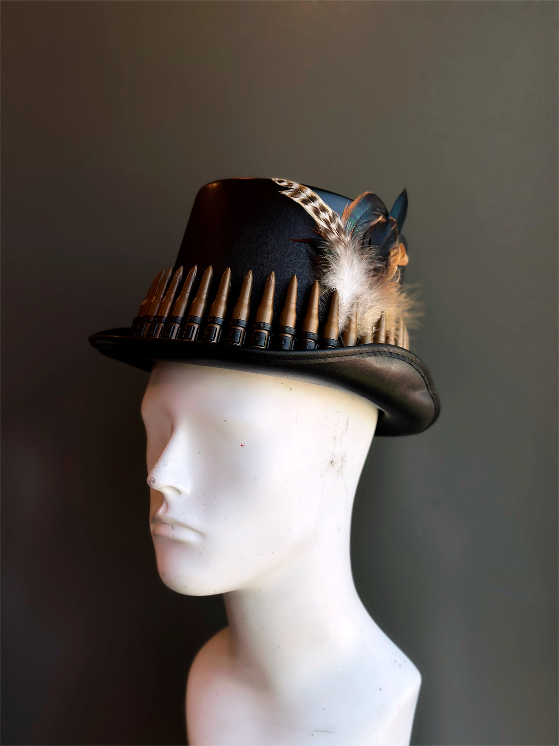 Steampunk top hat with bullet band and feathered accents