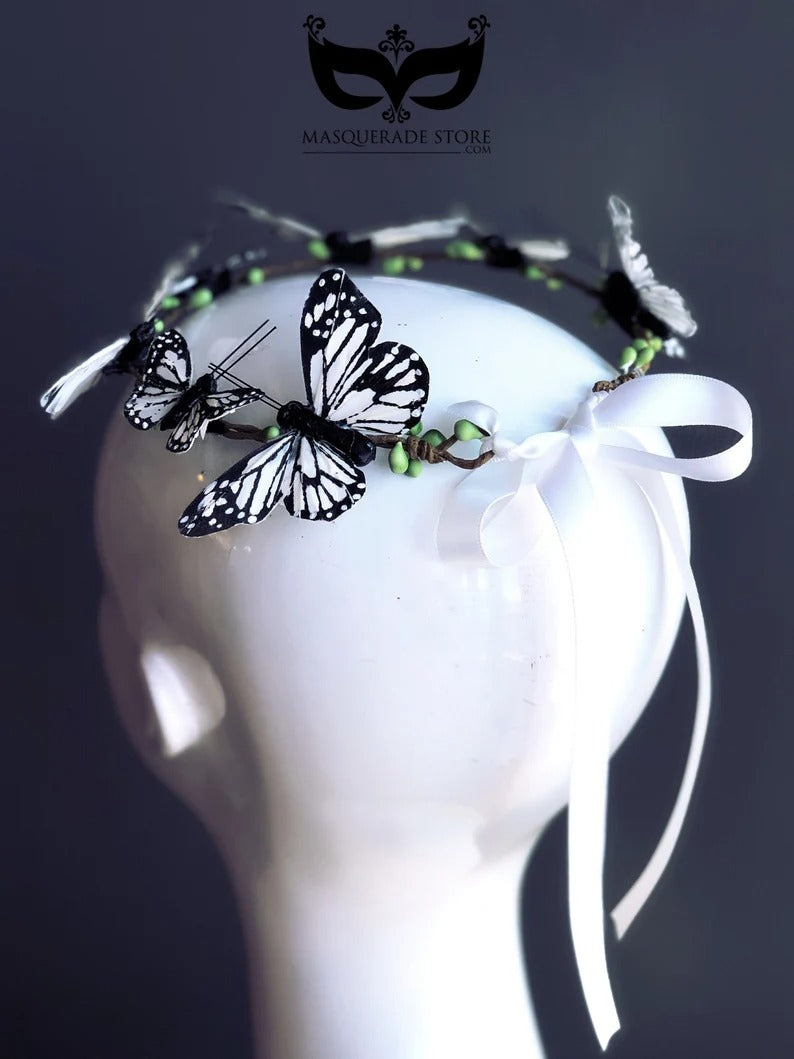 Black and white butterfly headband with satin ribbon tie for fairy costumes and festivals.