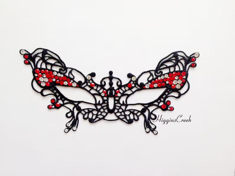 Elegant black butterfly lace masquerade mask with rhinestones for women’s prom, ball, or party.