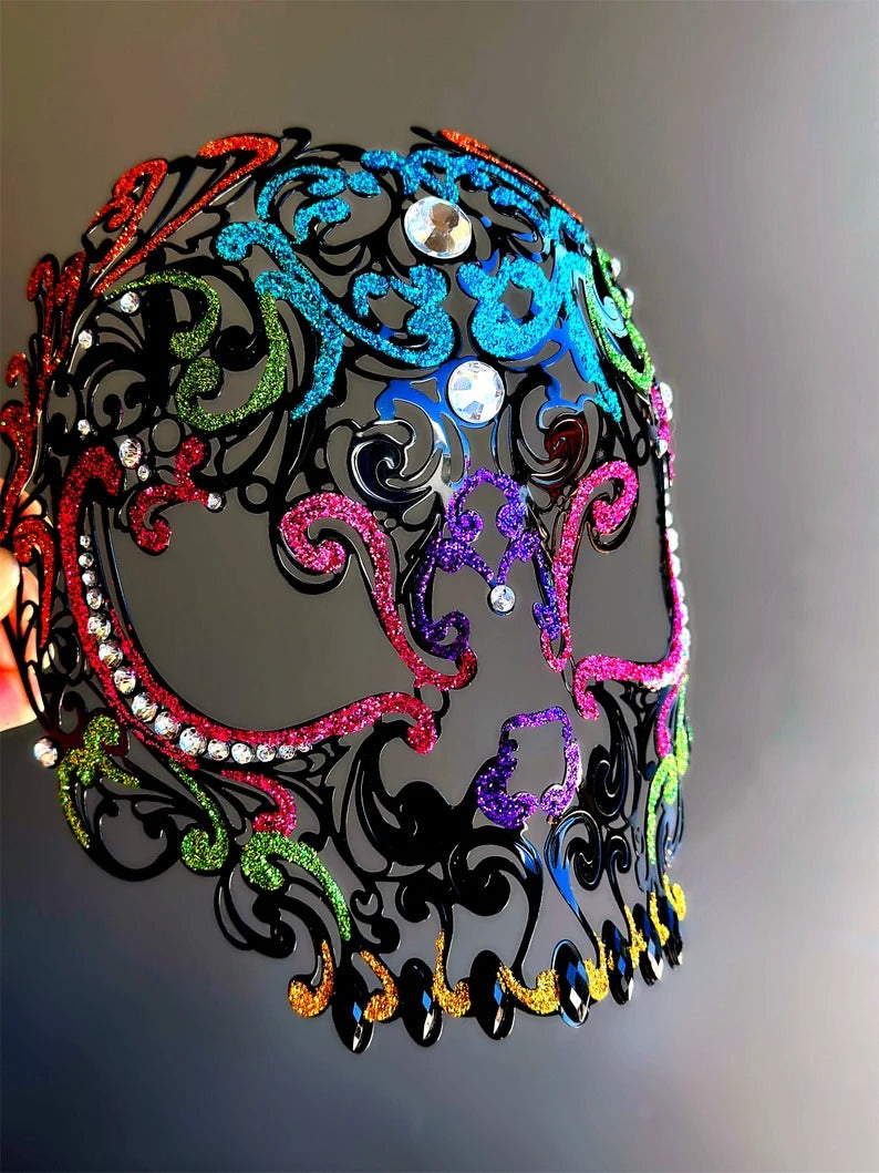 Rainbow glitter sugar skull masquerade mask with rhinestones, designed for Mardi Gras, Carnival, and Day of the Dead.