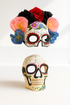Couples sugar skull masks with rose floral crown and spider web skull design.