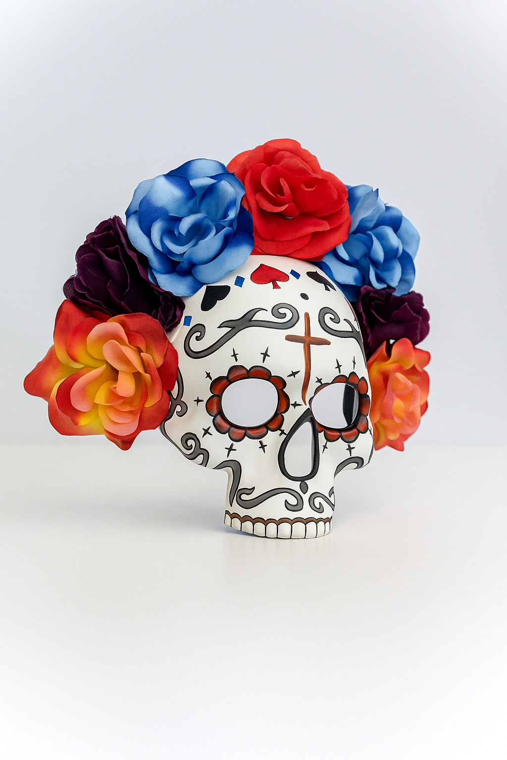 Sugar skull mask with multicolor flower crown, Day of the Dead festival costume mask with colorful floral details.