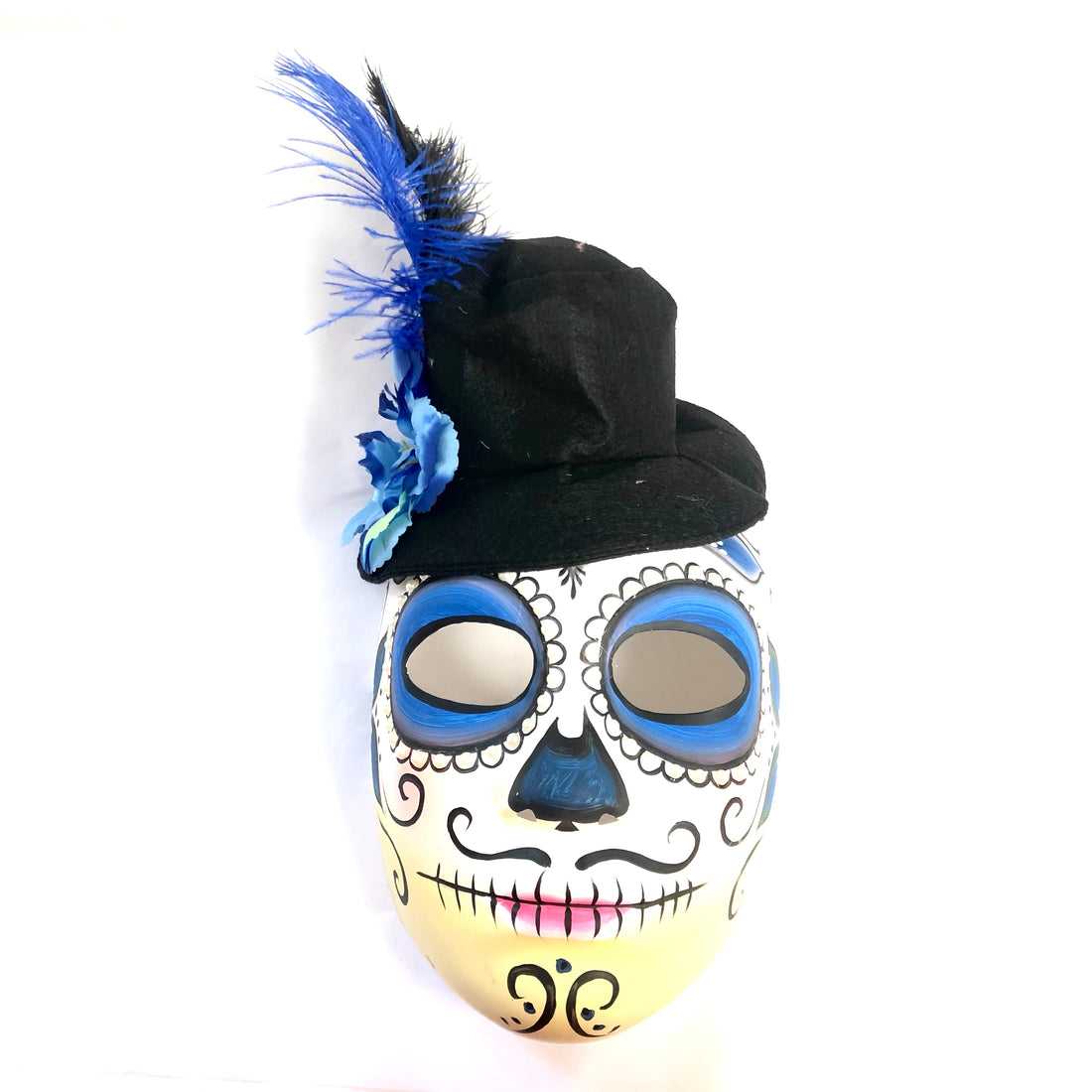 Day of the Dead skull mask with black hat and blue feather, hand-painted design.