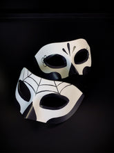 Day of the Dead-inspired spooky couples mask set with skull designs, ideal for Dia de los Muertos or Halloween events.