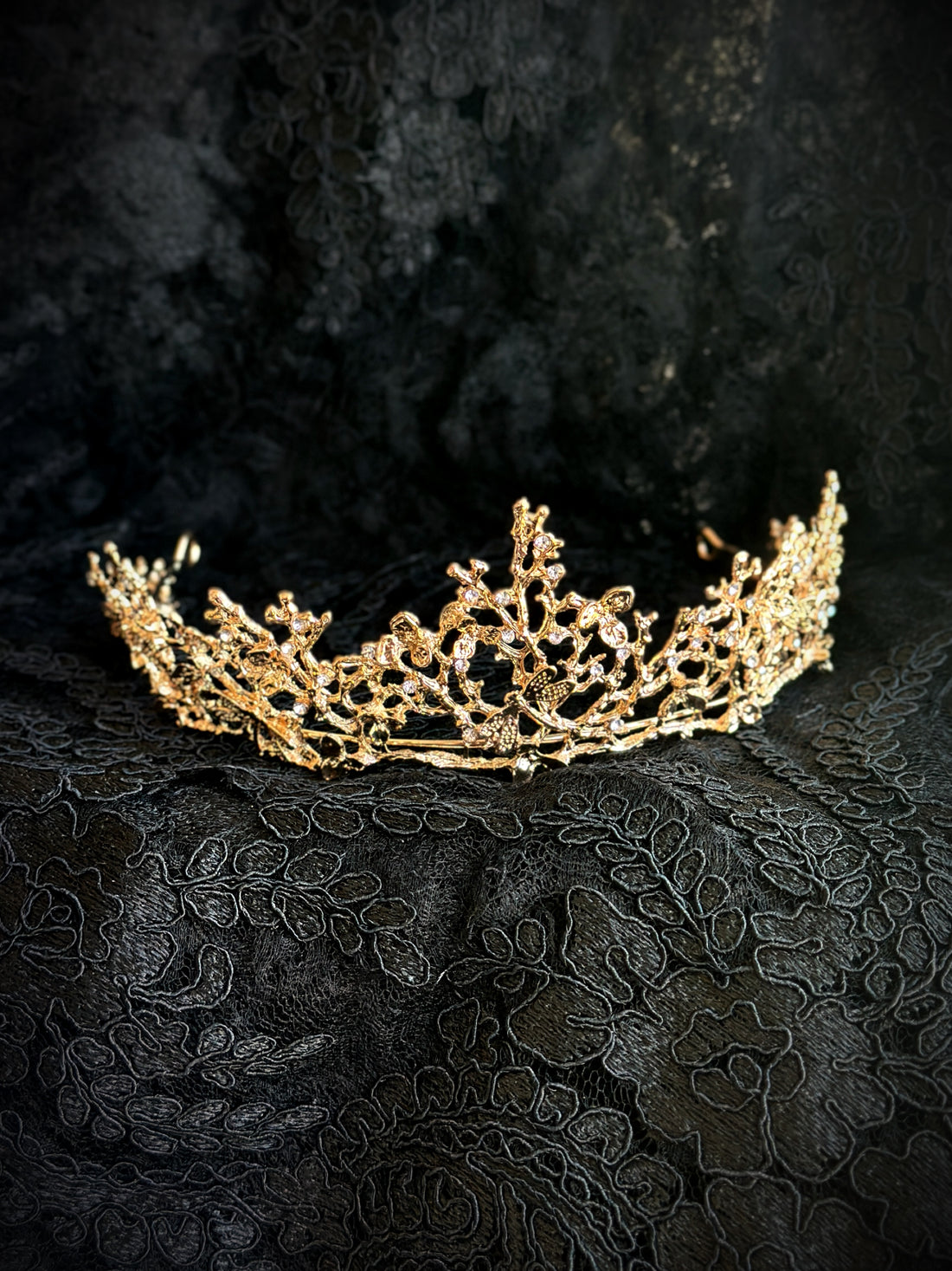 Gold crown with dragonfly and vine detailing, designed for fantasy weddings, pageants, or royal-inspired looks.