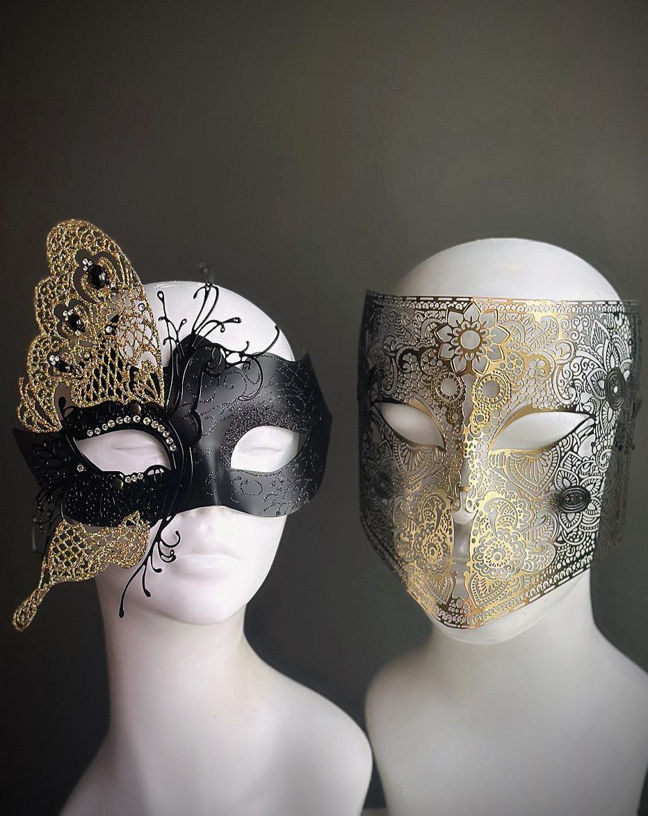 Elegant couples masquerade mask set with butterfly wing accents and ornate full-face black and gold mask

