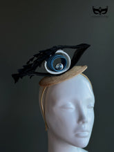 Evil eye crystal fascinator mini top hat with sculpted ribbon loops and gemstone center