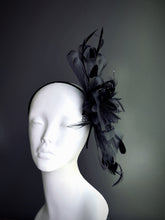 black fascinator hat with feathers and sheer tulle ribbon accents