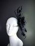 black fascinator hat with feathers and sheer tulle ribbon accents
