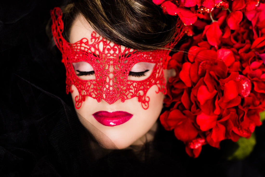 Fiery red fox lace mask with intricate lace details, ideal for masquerade events, Halloween, and costume parties.