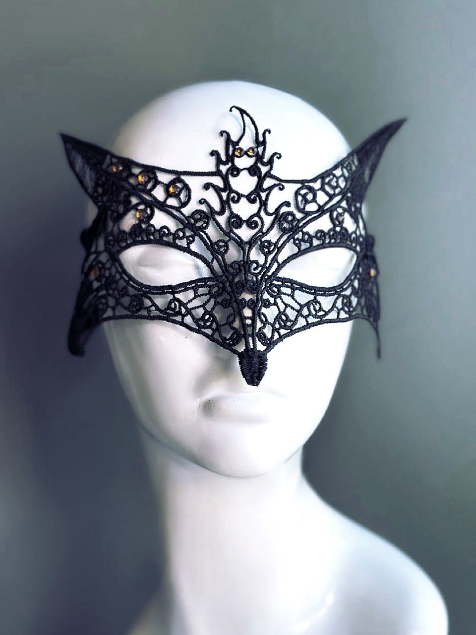 Black lace mask in fox silhouette, inlaid with rhinestones