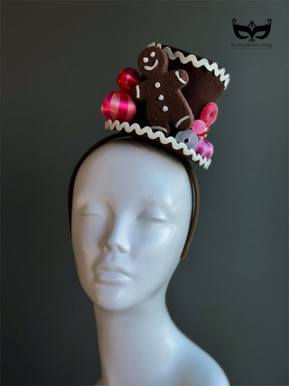 Gingerbread cookie Christmas mini top hat fascinator with festive candy on a top hat headband