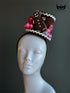 Gingerbread cookie Christmas mini top hat fascinator with festive candy on a top hat headband