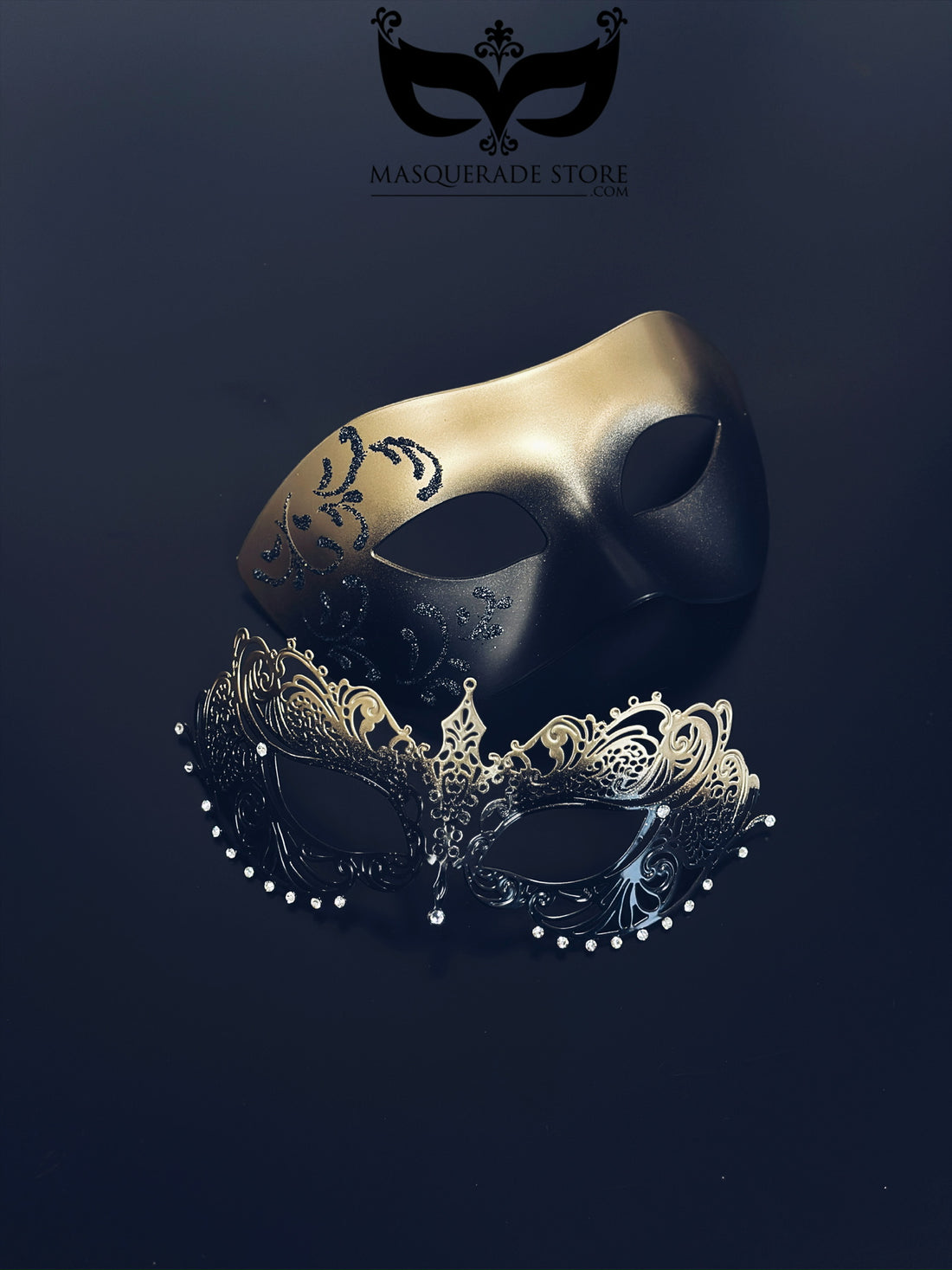 Gold and black with black filigree mask for men and a gold ombre laser cut metal mask with rhinestones for women