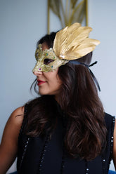 Elegant gold lace masquerade mask with feathers and rhinestones, Venetian-style women’s accessory