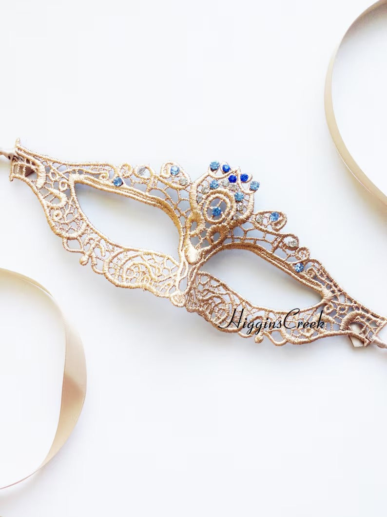 Elegant gold lace masquerade mask with sparkling blue rhinestones, Venetian-style lace eye mask for women, ideal for weddings, Halloween, prom, and masquerade parties.