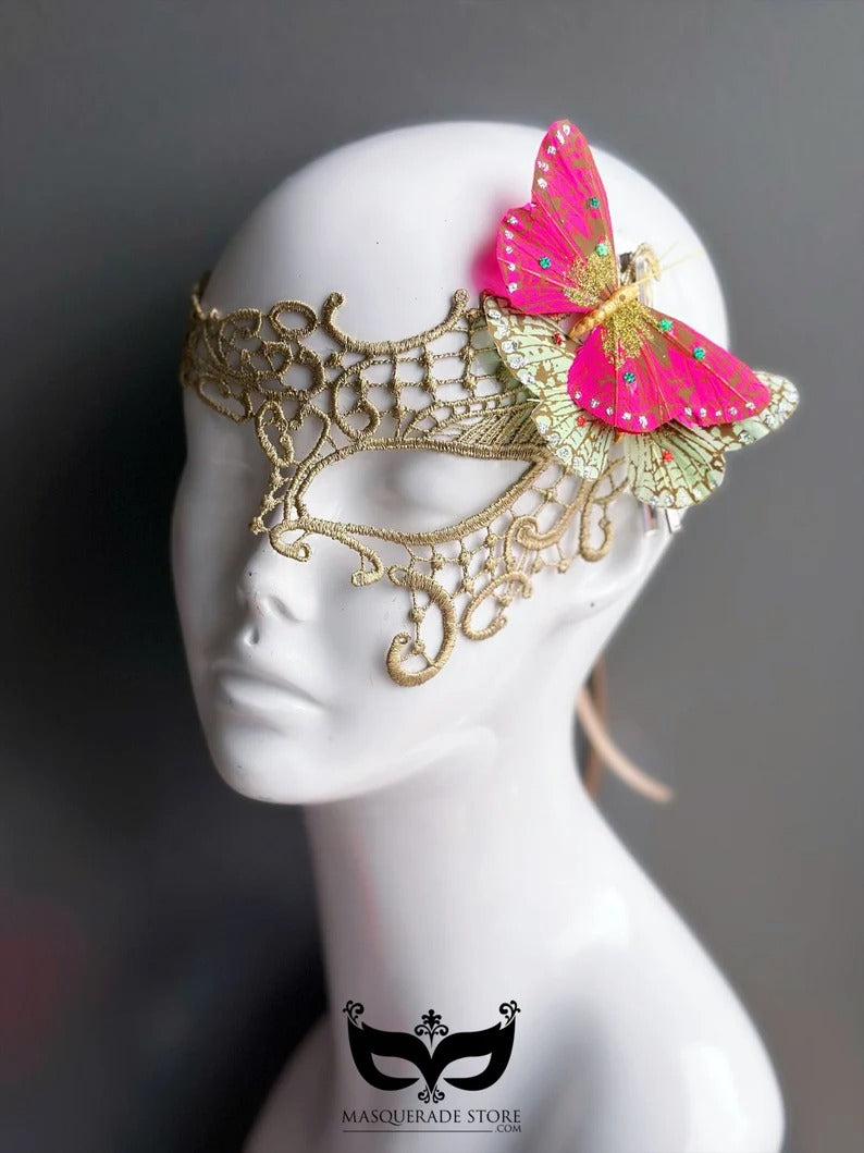 Elegant gold lace masquerade mask with pink butterfly accent, Venetian-inspired mask for women’s proms, parties, and galas.