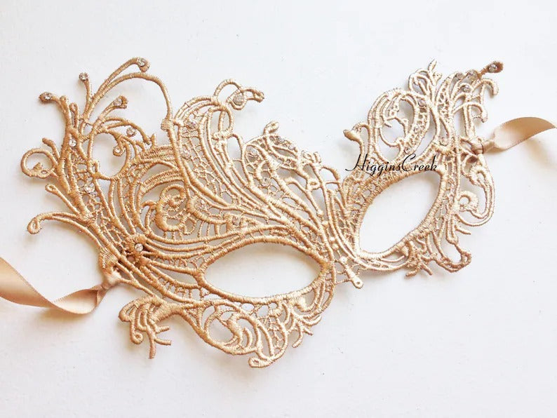 Gold lace masquerade mask with satin ribbons for women, ideal for Venetian balls, weddings, and costume parties.