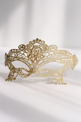 Elegant gold lace masquerade mask with Venetian details, ideal for balls, proms, or formal themed parties.