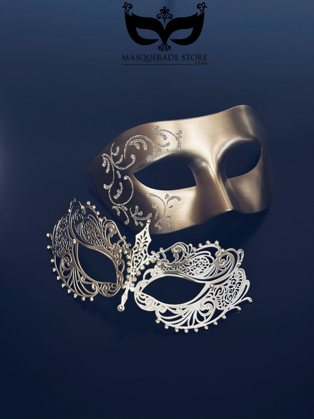 Gold couples masquerade masks with gold filigree detailing for men and laser-cut metal mask for women.