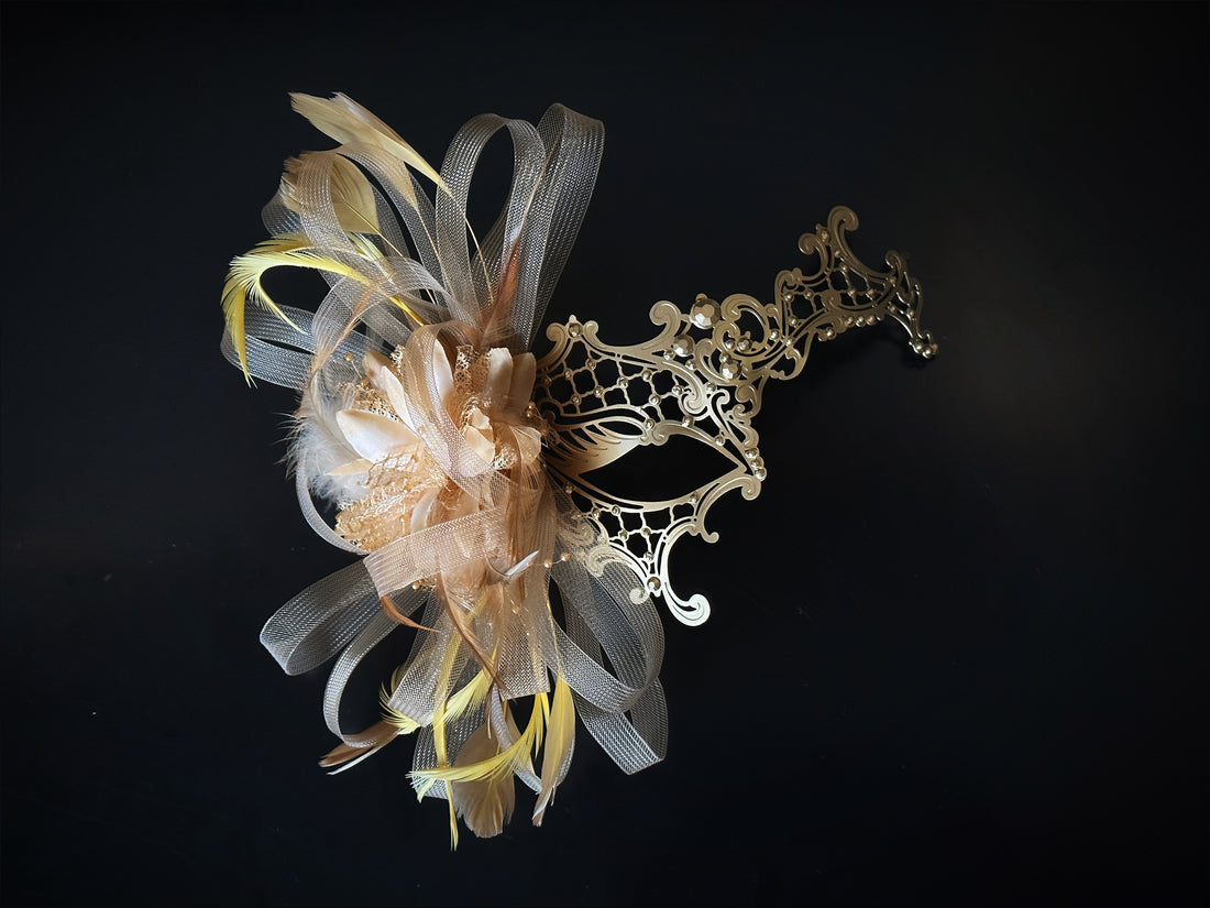 Gold baroque masquerade mask with filigree scrollwork and ivory feather and tulle accent for prom or Halloween