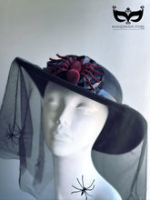 Black Halloween veil hat with red spider topper and mesh veil with crawling spider details, perfect for witches and gothic costumes.