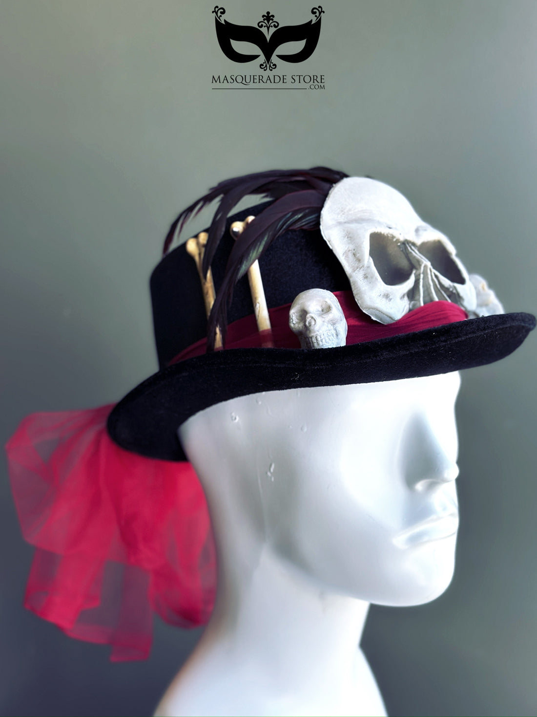 Halloween witch doctor hat with skulls, feathers, and tribal bones, finished with a red veil, perfect for voodoo costumes.