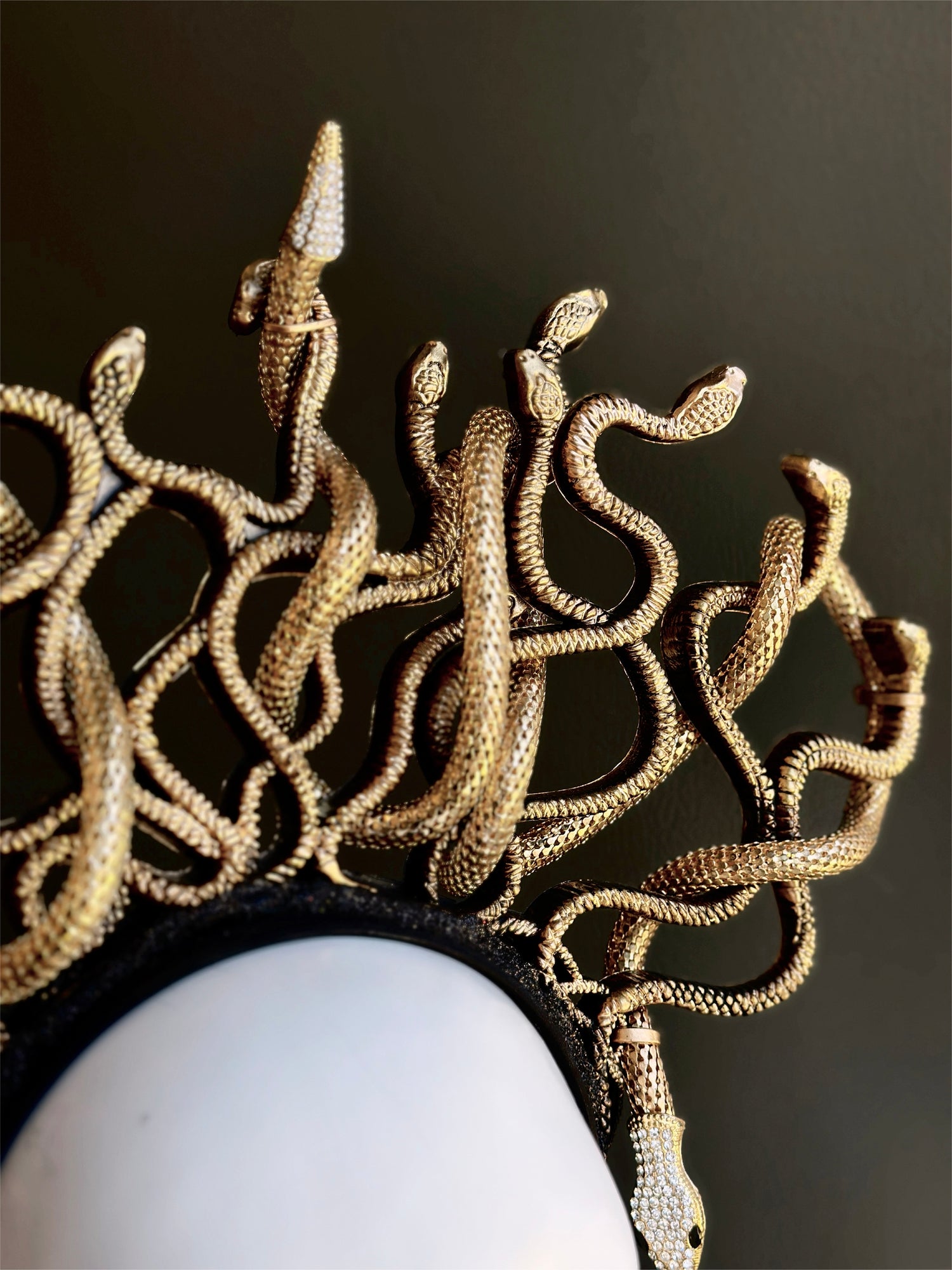 Handcrafted golden Medusa crown with elaborate serpent design for fantasy and mythic wear