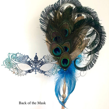 Venetian handheld masquerade mask with peacock feathers, jeweled details, and blue feather plumes.