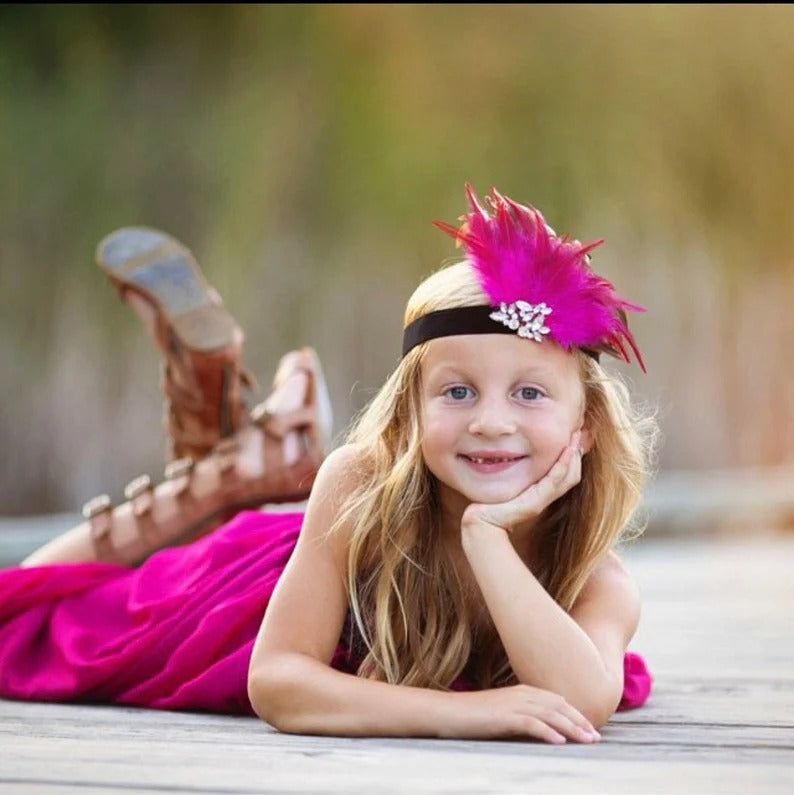 Kids headband with hot pink feather and rhinestone—perfect for flapper-themed dress-up or parties.