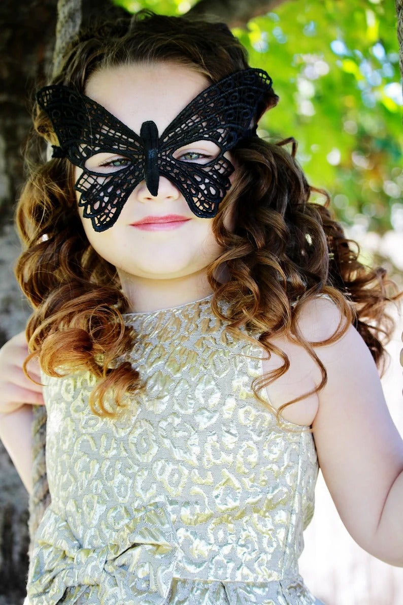Kids black butterfly masquerade mask for parties and dress-up.